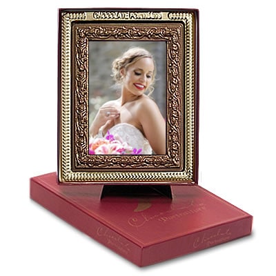 A picture frame sitting on top of a box.
