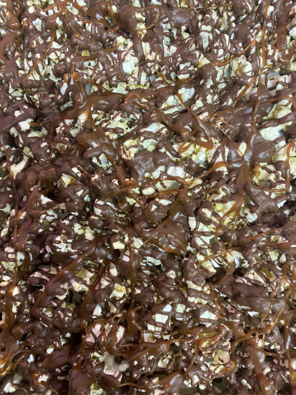 A close up of the brown and white speckled surface.