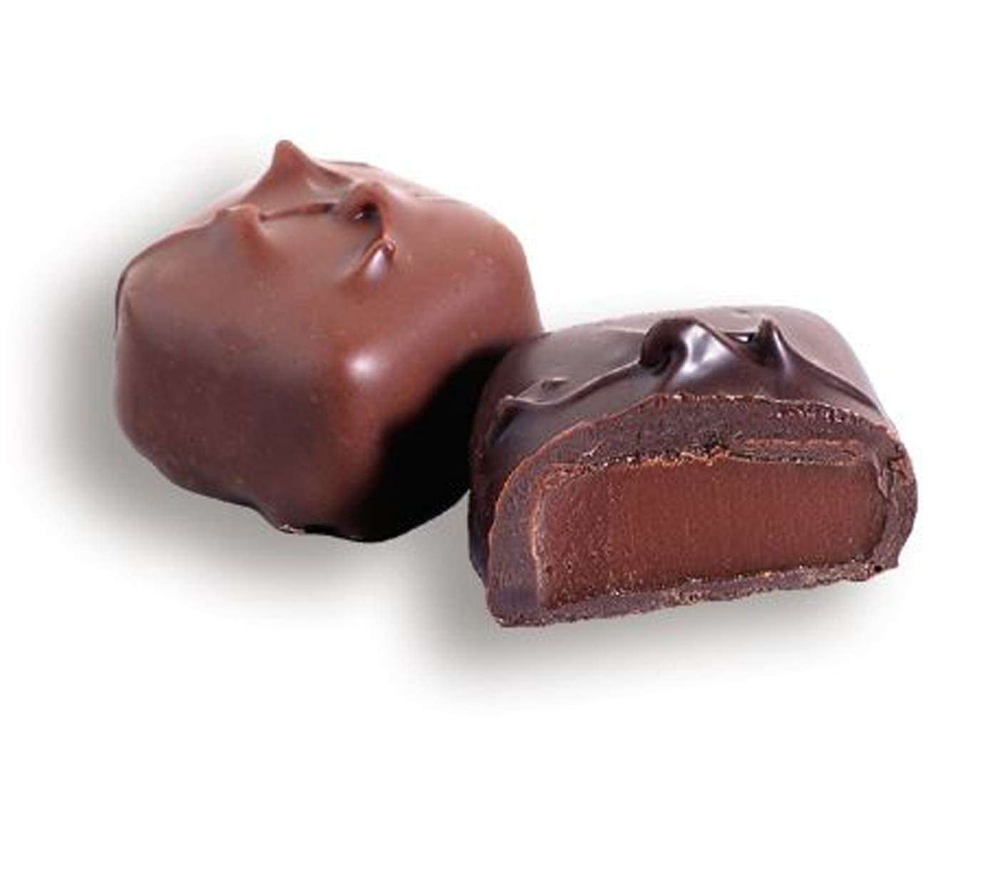 A close up of two chocolate candies on top of a table.