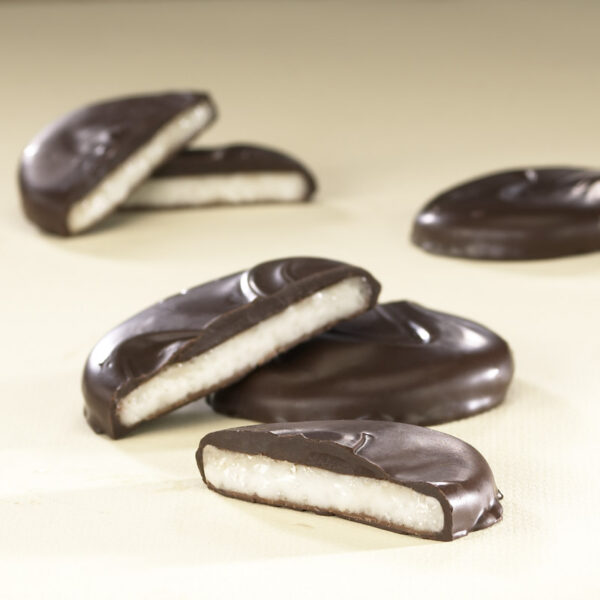 A close up of some chocolate covered cookies